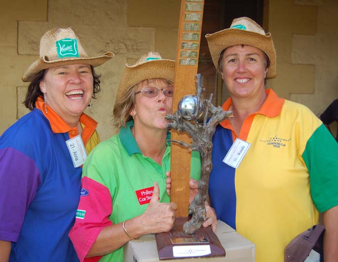Winners with trophy.